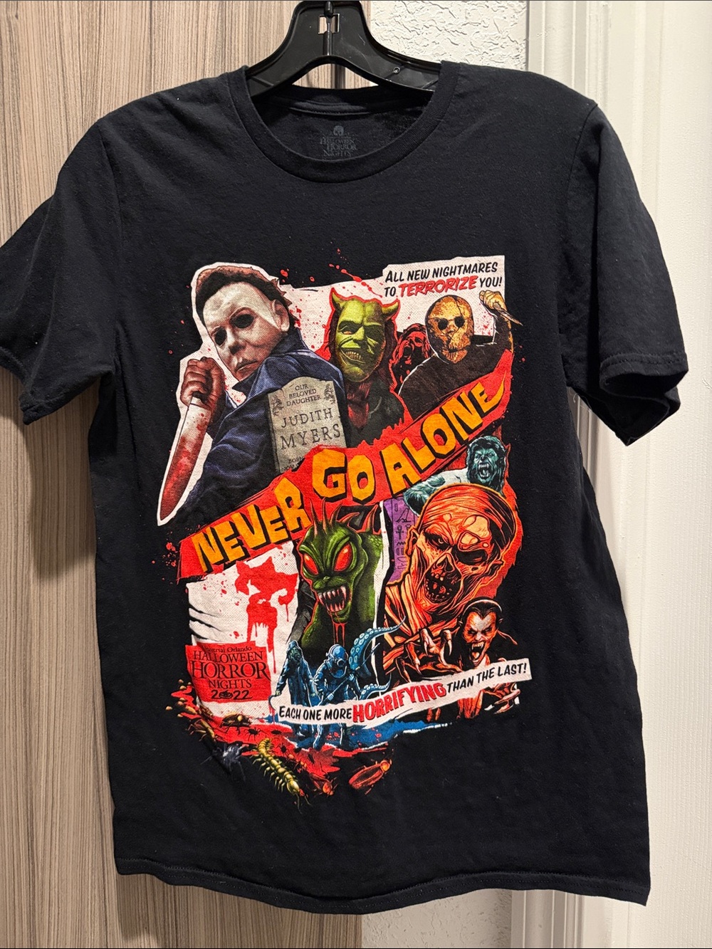 Never Go Alone Black Horror Graphic Tee - Classic Crewneck